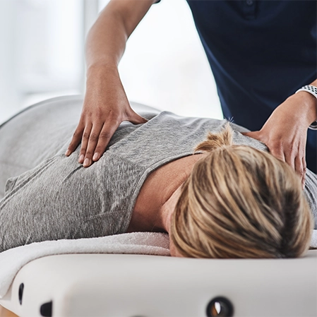 Chiropractic Encinitas CA Woman Receiving Adjustment